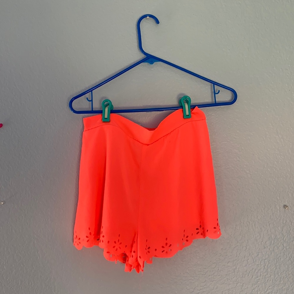 Neon orange beach shorts
